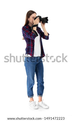 Professional photographer taking picture on white background