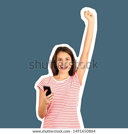 Portrait of a happy girl holding a mobile phone and raising her hand to the top celebrating good news. emotional girl Magazine collage style with trendy color background.