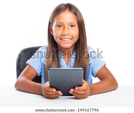 girl playing with a tablet on a white background