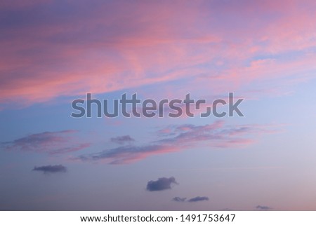 Sunset clouds with smokey abstract pattern Royalty-Free Stock Photo #1491753647