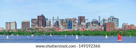 Boston Charles River panorama with urban skyline skyscrapers and sailing boat.