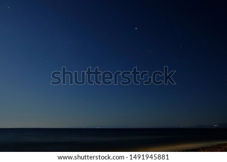 mediterranean sea at night and lesvos island.