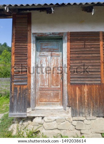 Old abandoned wooden house in the Carpathians