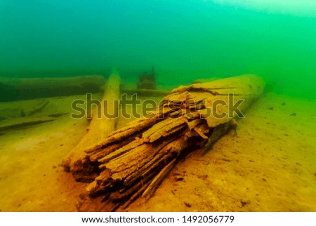 Remains of a wooden pier Munising Bay  in Lake Superior. Royalty-Free Stock Photo #1492056779
