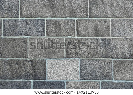 Texture of a stone wall. Old castle stone wall. Stone wall as a background or texture. Rock texture. 