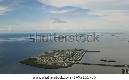 Wide aerial view of the Key West, Florida, seen from an airplane window