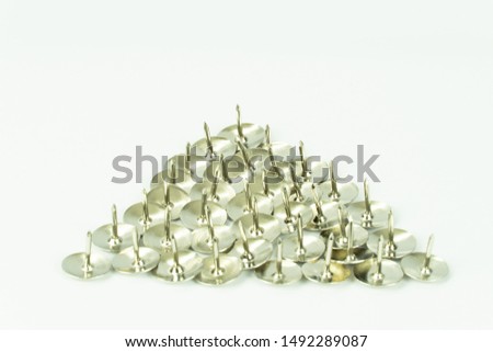 group of silver thumb tack, push pin