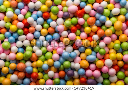Small colored balls. Background.