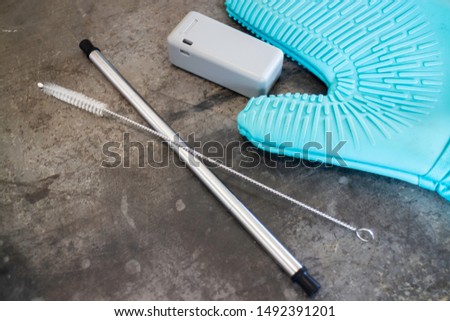 Reusable collapsible drinking straw and folding box, stock photo