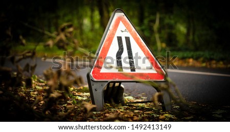 Road narrows on left road warning sign - UK highway code