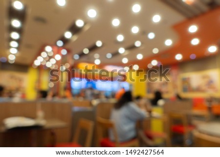 Abstract blur modern interior of restaurant cafe background for design