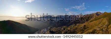 Panoramic aerial view of the Apuan Alps at sunset