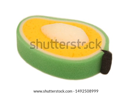 One soft rectangle foam rubber green color for washing isolated on white background stock photo