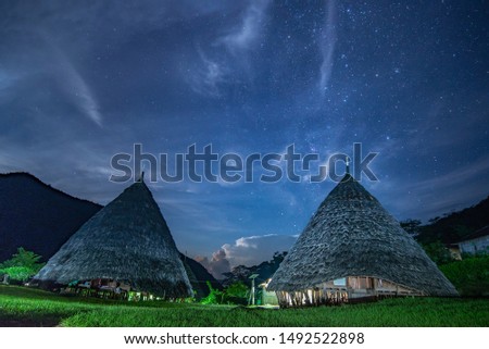 Wae Rebo traditional village with Milky Way ,Wae Rebo is an old Manggaraian village, situated in pleasant, isolated mountain scenery. Feels fresh air and see the beautiful moment Flores, Indonesia