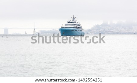 Super Yacht berthed in a Luxury of Fog Royalty-Free Stock Photo #1492554251