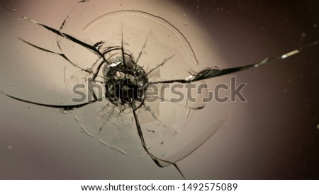 Holes and cracks on the glass On defocused background