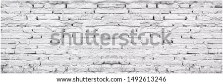 Old white bricks wall with brick textured vintage retro style for panorama seamless background and texture.