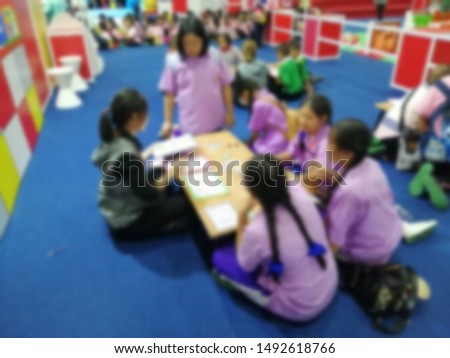 Blurred images of students are learning with participatory learning using group processes and brainstorming methods, 
Group activity.