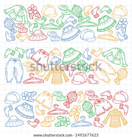 Vector set of hand drawn doodles of fashionable clothes and accessories for men, women and children. Sketches for use in design