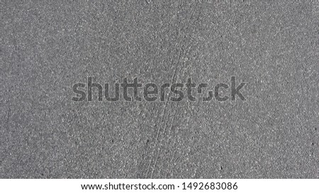 Helsinki grey pavement texture with scratches