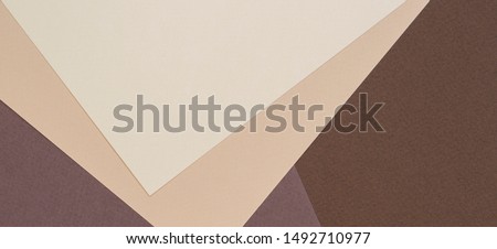 Color papers geometry composition background with beige and brown color tones