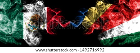 Mexico vs Seychelles, Seychelloise smoky mystic flags placed side by side. Thick colored silky abstract smokes banner of Mexican and Seychelles, Seychelloise