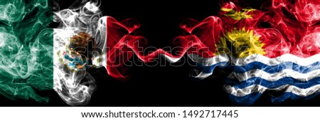 Mexico vs Kiribati smoky mystic flags placed side by side. Thick colored silky abstract smokes banner of Mexican and Kiribati
