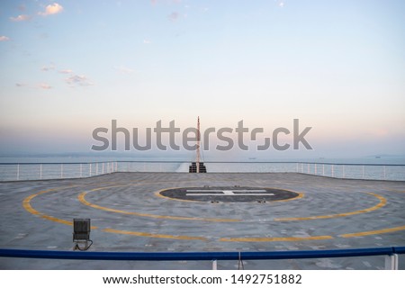Helicopter pad on the upper deck of a big passenger ship.
