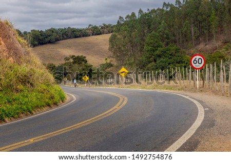 Vertical signage on MG 353 highway, between the cities of Guarani and Piraúba, Minas Gerais state, Brazil