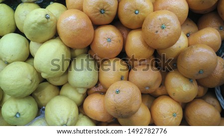 fresh lemon and orange with deferent color