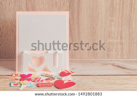 Lovely white pearl paper card frame I heart you. Simple and minimal loveable photo style. Copy space for picture. Conceptual for family, friend, couple, lover and valentine. Love photo concept.