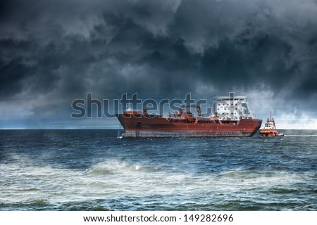 Tanker ship at sea during a storm. Royalty-Free Stock Photo #149282696