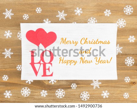 Brown wooden Christmas background with snowflakes. Winter love concept