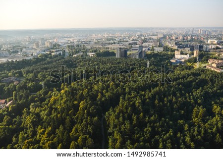 Panoramic view of Vilnius, Capital of Lithuania. Early morning landscape shot made from air balloon. View of green trees and parks of city