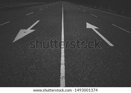 Left and right arrow on the road