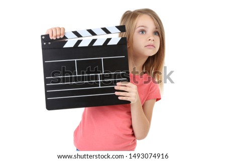 Little girl with clapper board isolated on white background
