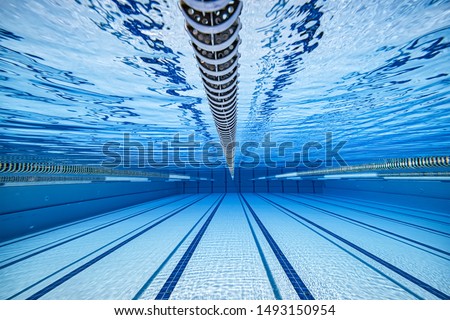 Olympic Swimming pool underwater background. Royalty-Free Stock Photo #1493150954