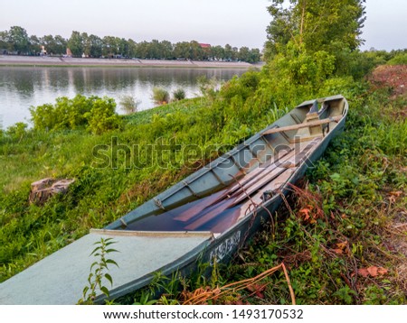 An old fishing boat drawn ashore
