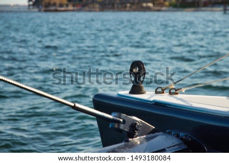 Front of a catamaran over the blue ocean. Royalty-Free Stock Photo #1493180084