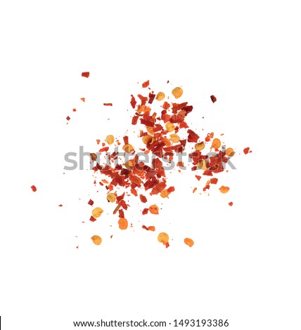 dried chili flakes and seeds isolated on white background, top view Royalty-Free Stock Photo #1493193386