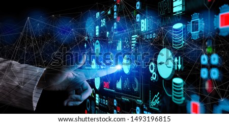 Business data analytics process management with businesswoman hand touching connected gear cogs with KPI financial charts and graph and automated marketing dashboard.