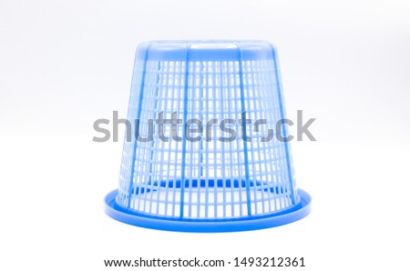Blue plastic basket, isolated from white background