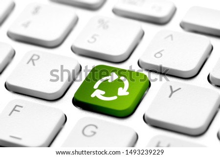 Recycle icon on computer keyboard for genn engery concept