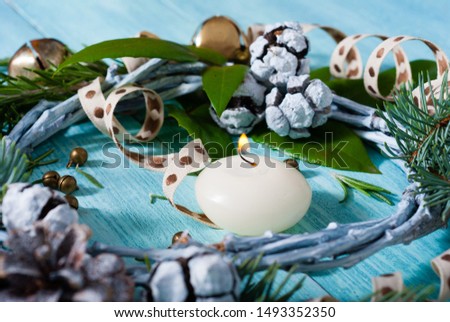 Christmas wreath on blue wood table
