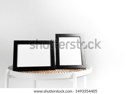  Blank black picture frame template for place image or text inside with
, Picture frames placed on the table
