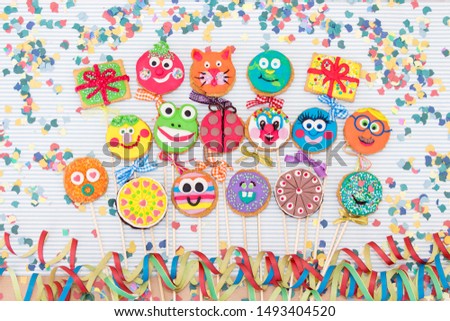 Party biscuits. Funny and colorful faces.  