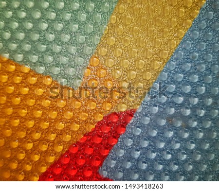 red, blue, yellow colorful background with bubble texture abstract photo