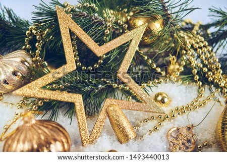 Christmas card. Gold christmas star on snow