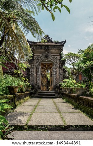 Traditional balinese door facade of Hindu temple in Ubud, Bali.