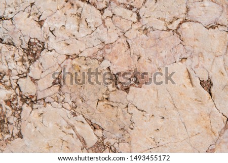Cracked antique red marble texture and background. Rough natural rock texture.